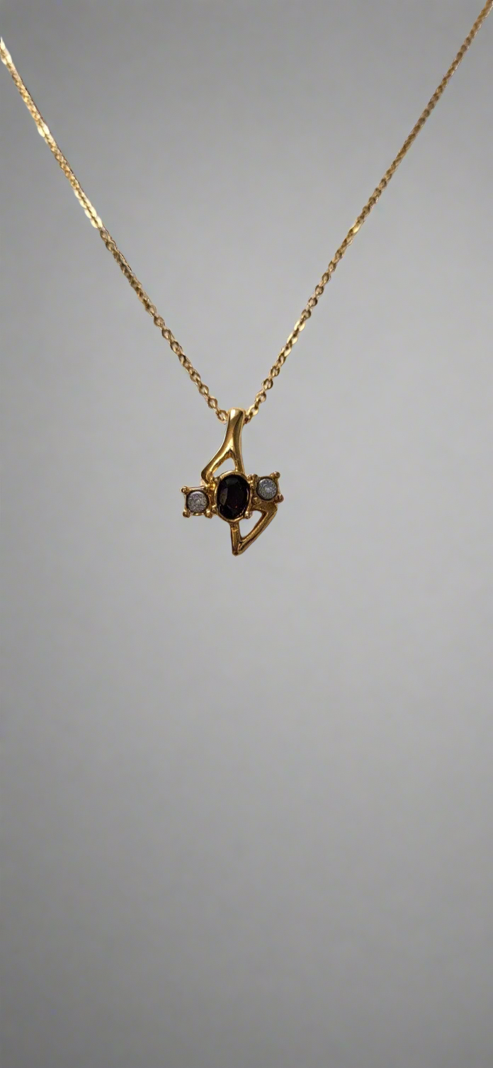 Three stone gold tone