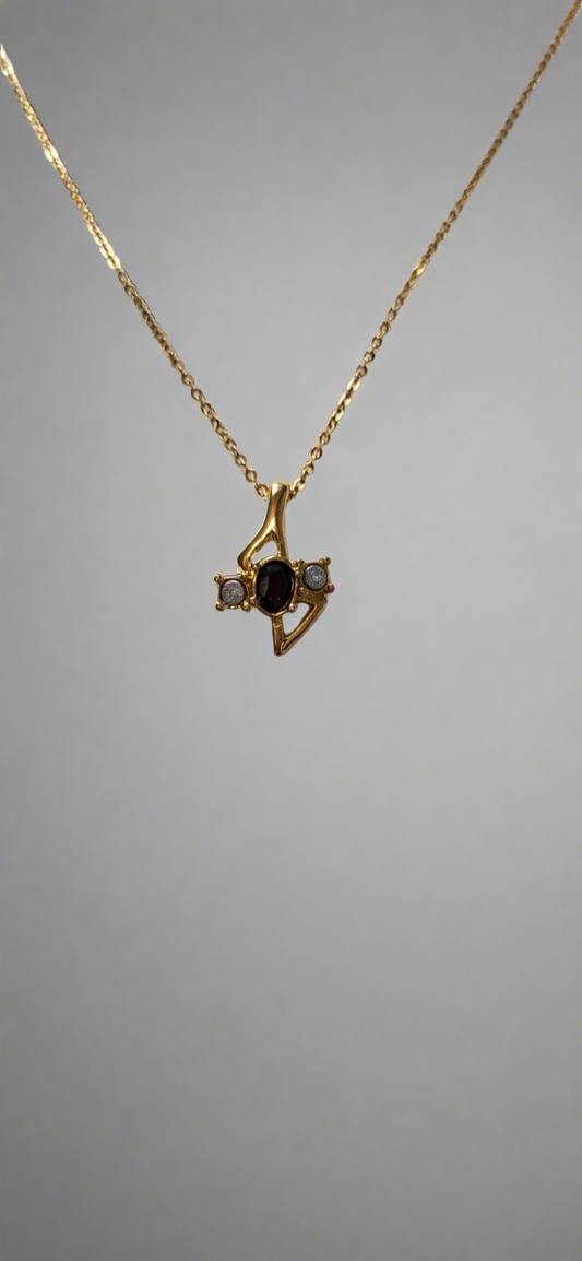 Three stone gold tone