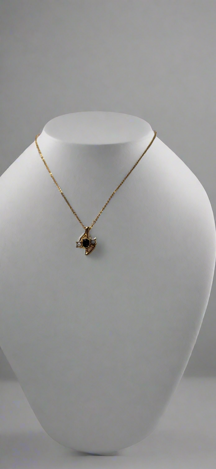 Three stone gold tone