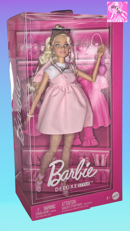 Barbie deluxe style with a bow doll
