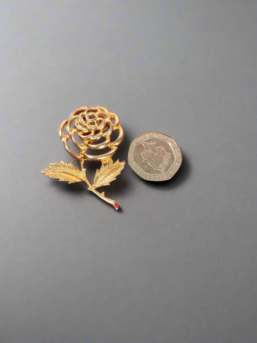 Sarah Coventry rose gold tone brooch